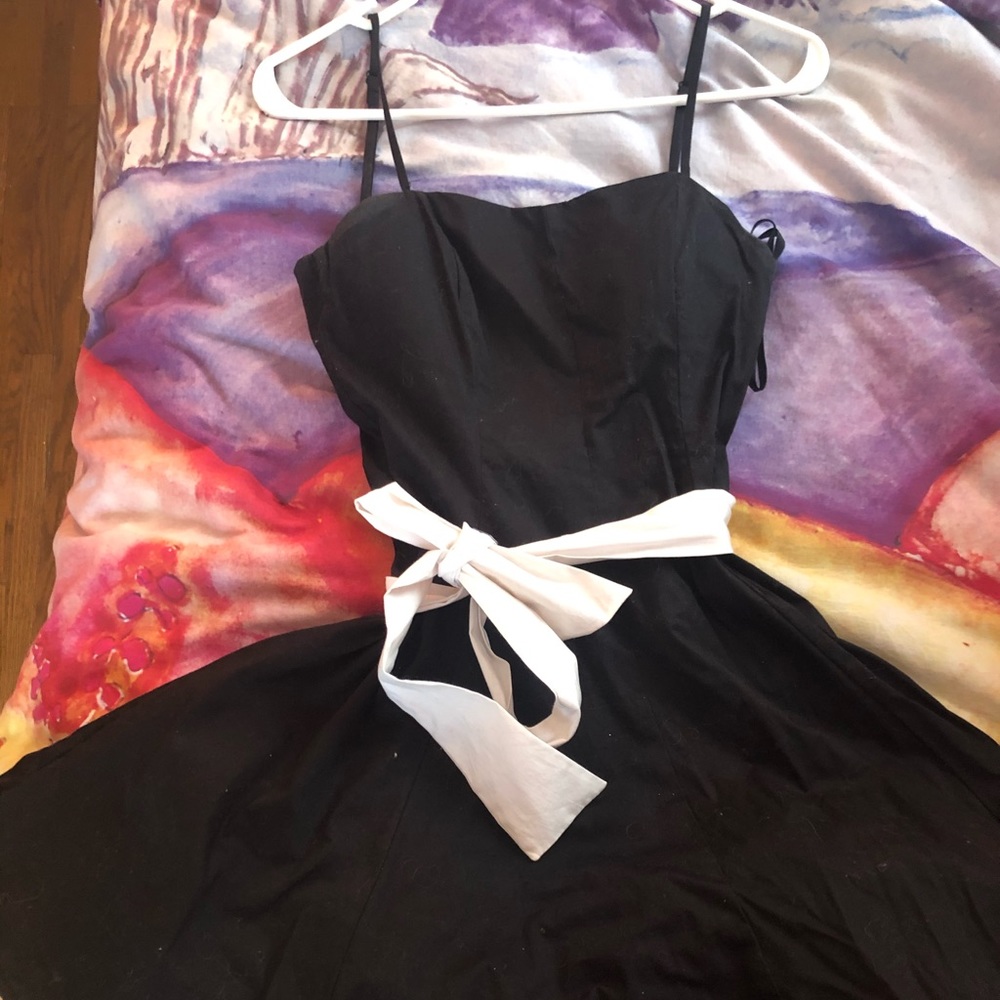 Sleeveless black and white homecoming dress